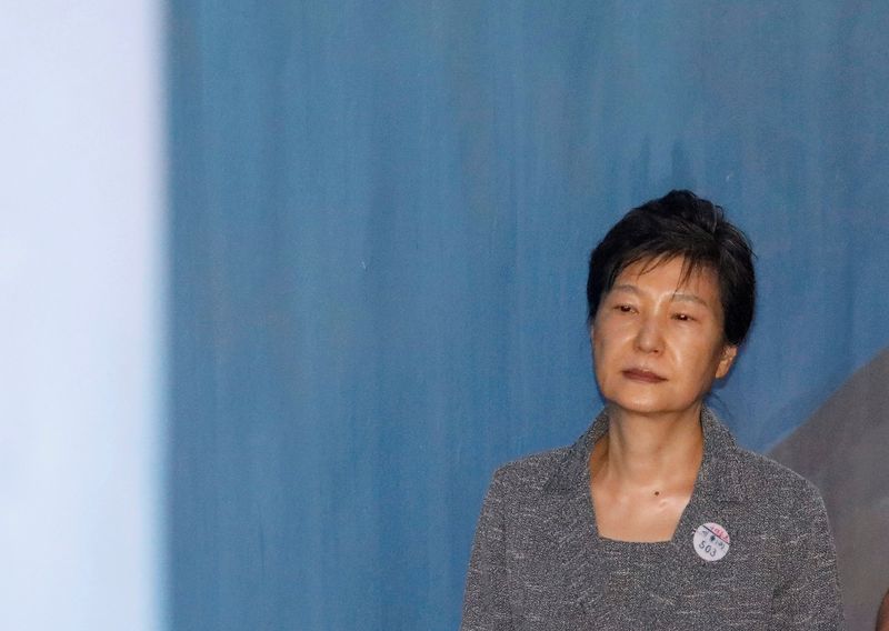&copy; Reuters. 　収賄罪などで実刑判決を受けた韓国の朴槿恵前大統領に対する恩赦が発効した。写真は１７年８月、法廷で撮影（２０２１年　ロイター/Kim Hong-Ji）