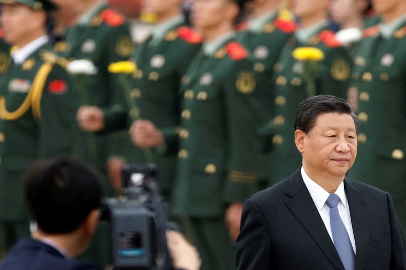 &copy; Reuters. الرئيس الصيني شي جين بينغ في بكين يوم 30 ديسمبر كانون الأول 2021. تصوير: كارلوس جارسيا رولنز - رويترز. 