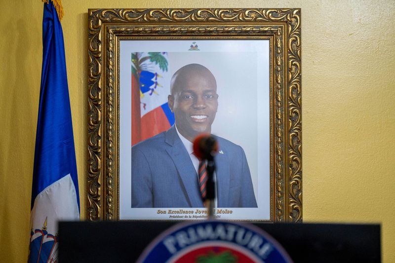 &copy; Reuters. FILE PHOTO: A picture of the late Haitian President Jovenel Moise hangs on a wall before a news conference by interim Prime Minister Claude Joseph at his house, almost a week after his assassination, in Port-au-Prince, Haiti July 13, 2021.  REUTERS/Ricard