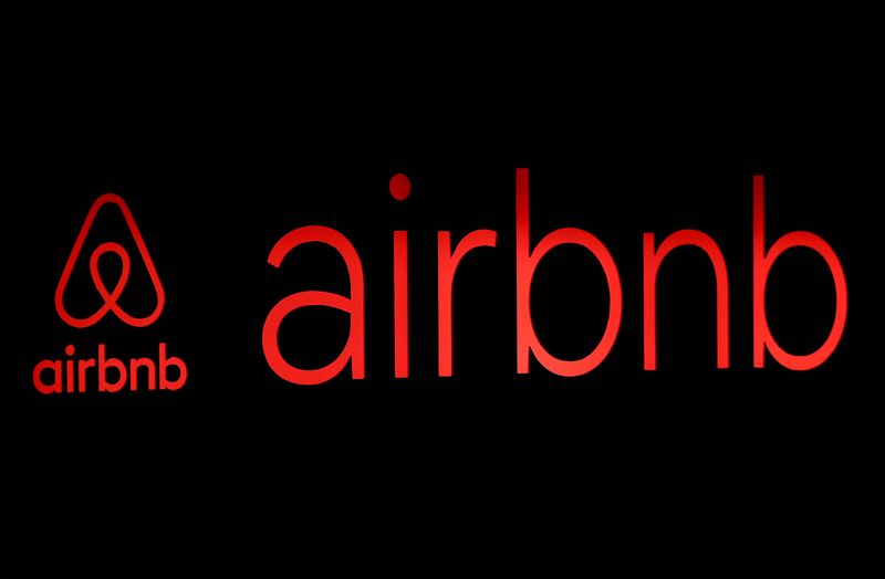 &copy; Reuters. FILE PHOTO: The logos of Airbnb are displayed at an Airbnb event in Tokyo, Japan, June 14, 2018. REUTERS/Issei Kato/File Photo