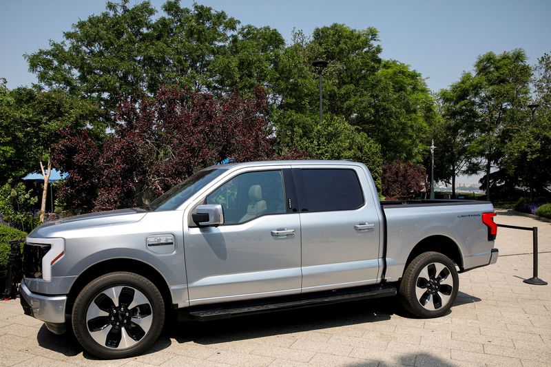© Reuters. FILE PHOTO: The Ford F-150 Lightning pickup truck is seen during a press event in New York City, U.S., May 26, 2021.  REUTERS/Brendan McDermid