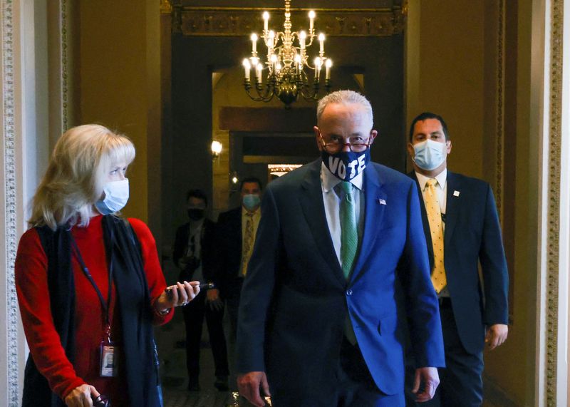 &copy; Reuters. FILE PHOTO: U.S. Senate Majority Leader Chuck Schumer (D-NY) wallks to his office in the U.S. Capitol in Washington, U.S. November 1, 2021.  REUTERS/Jonathan Ernst