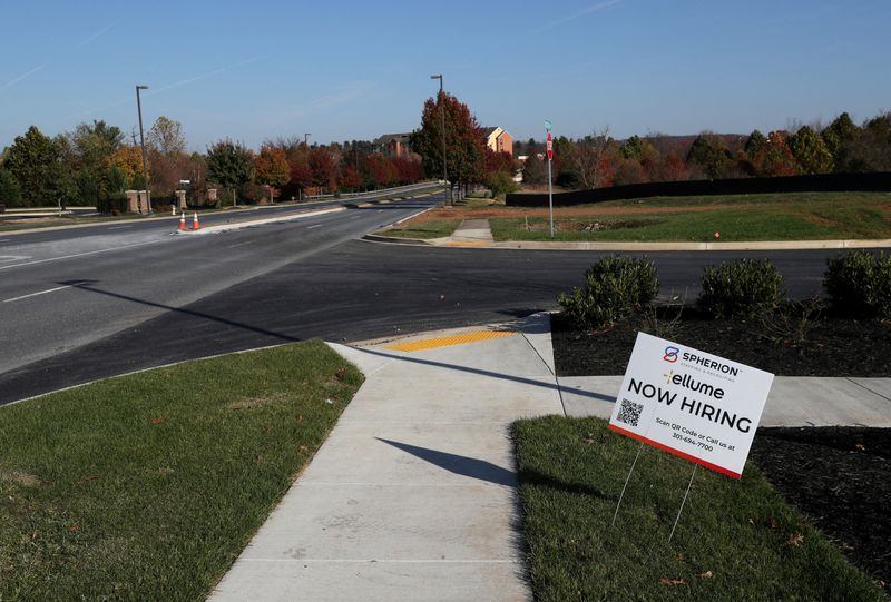 &copy; Reuters. FILE PHOTO: A hiring sign is posted near an Ellume building that is under construction in Frederick, Maryland, U.S., November 18, 2021. Picture taken November 18, 2021. REUTERS/Leah Millis