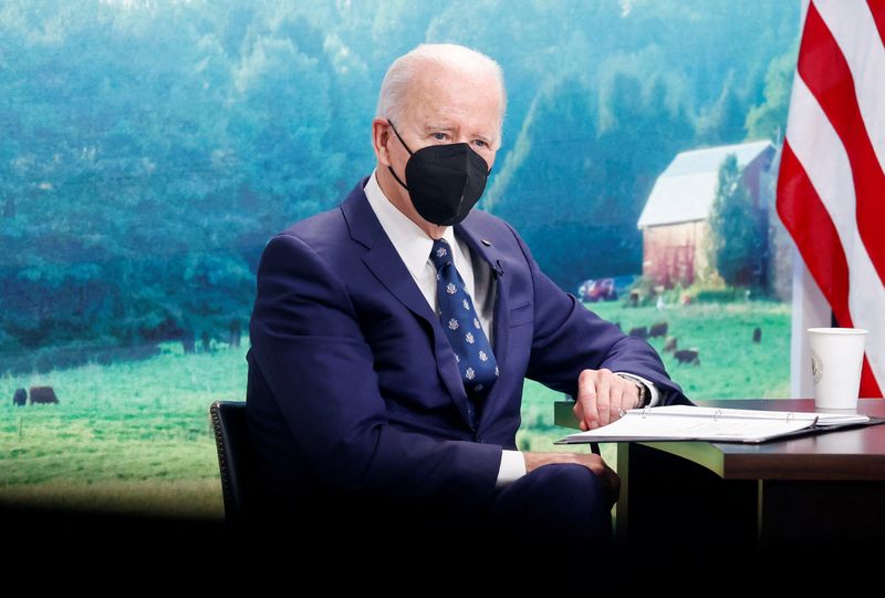 &copy; Reuters. FILE PHOTO: U.S. President Joe Biden looks on during a video conference with farmers, ranchers and meat processors to discuss meat and poultry supply chain issues, from an auditorium on the White House campus in Washington, U.S. January 3, 2022. REUTERS/J