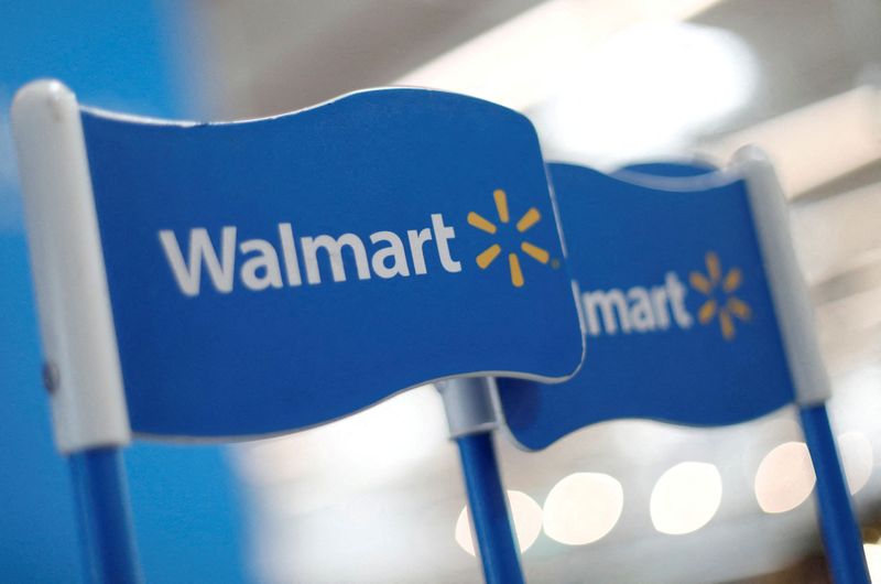 &copy; Reuters. FILE PHOTO: Walmart signs are displayed inside a Walmart store in Mexico City, Mexico March 28, 2019. REUTERS/Edgard Garrido/File Photo