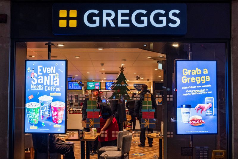 &copy; Reuters. FILE PHOTO: A Christmas themed window display is pictured at a branch of Greggs bakery chain in London, Britain, November 18, 2021. REUTERS/May James