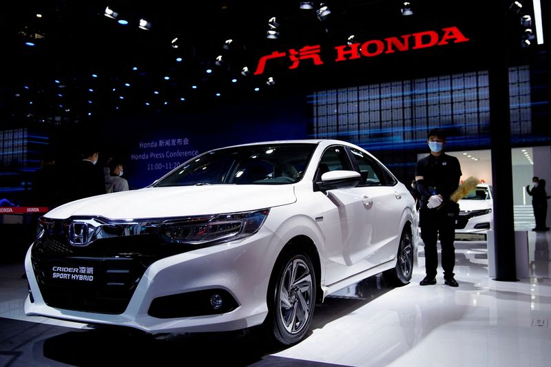&copy; Reuters. FILE PHOTO: A Honda Crider Sport Hybrid vehicle is seen displayed at the GAC Honda booth during a media day for the Auto Shanghai show in Shanghai, China April 19, 2021. REUTERS/Aly Song/File Photo