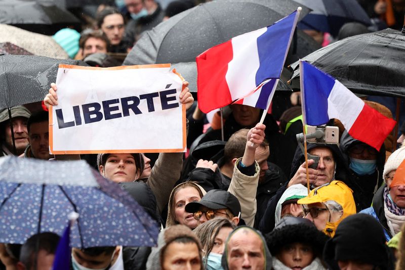 Anti-vax protesters tell France's Macron: 'We'll piss you off'