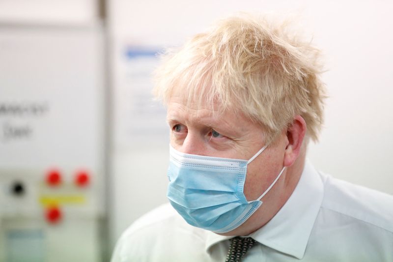 &copy; Reuters. FILE PHOTO: Britain's Prime Minister Boris Johnson during a visit to a coronavirus disease (COVID-19) vaccine centre in Northampton, Britain, January 6, 2022.  REUTERS/Peter Cziborra/Pool