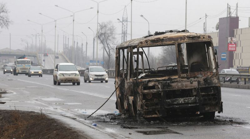 &copy; Reuters. FILE PHOTO: A view shows a bus, which was burnt during mass protests triggered by fuel price increase, in Almaty, Kazakhstan January 8, 2022. REUTERS/Pavel Mikheyev