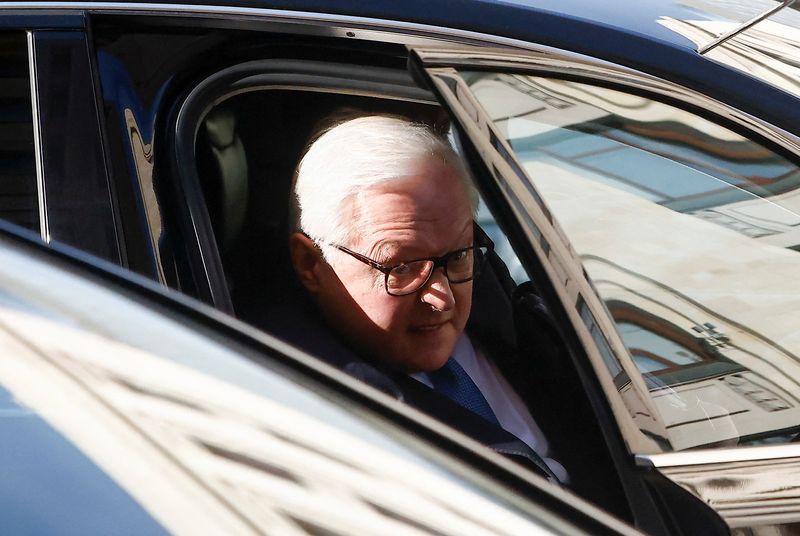 © Reuters. FILE PHOTO: Russia's Deputy Foreign Minister Sergei Ryabkov sits into a car after talks with U.S. Under Secretary of State Victoria Nuland in Moscow, Russia October 12, 2021. REUTERS/Maxim Shemetov