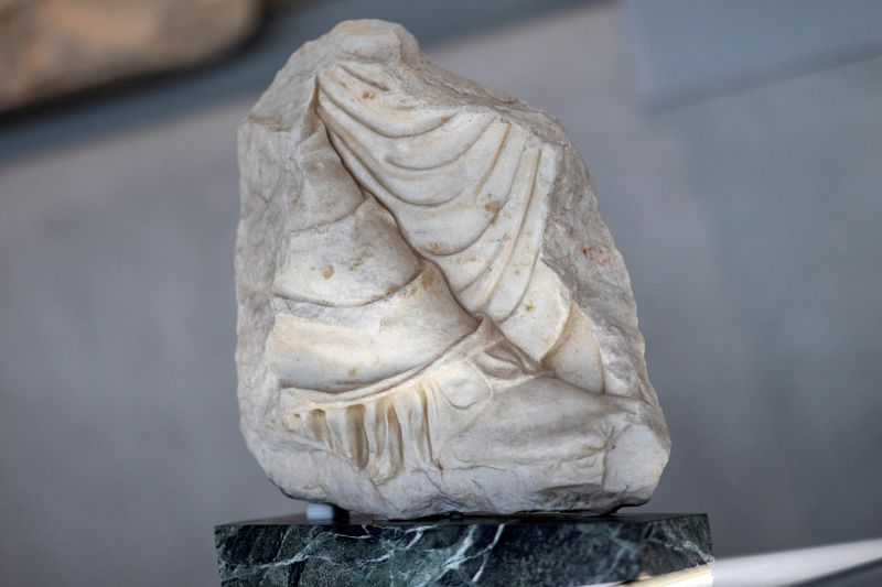 &copy; Reuters. A fragment of the Parthenon temple, on loan from the Antonino Salinas Regional Archaeological Museum of Palermo, is displayed at the Parthenon Gallery of the Acropolis Museum in Athens, Greece, January 10, 2022. REUTERS/Alkis Konstantinidis