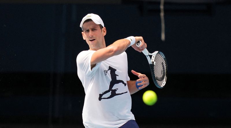 © Reuters. Serbian tennis player Novak Djokovic practices ahead of the Australian Open at Melbourne Park in Melbourne, Australia, January 11, 2022.  Tennis Australia/Scott Barbour/Handout via REUTERS   