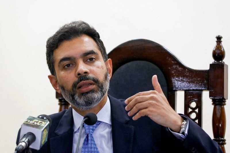 &copy; Reuters. FILE PHOTO: Reza Baqir, Governor of the State Bank of Pakistan (SBP), gestures during a news conference at the head office in Karachi, Pakistan January 22, 2021. REUTERS/Akhtar Soomro