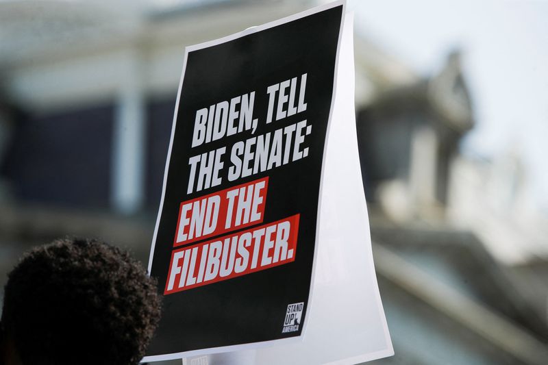 © Reuters. A sign is urging the Senate to 