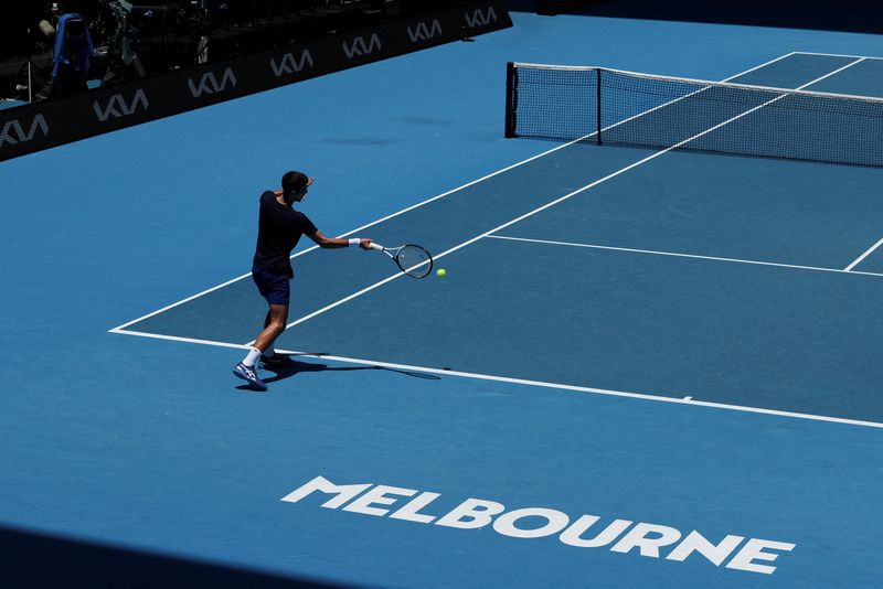 &copy; Reuters. Serbian tennis player Novak Djokovic practices at Melbourne Park as questions remain over the legal battle regarding his visa to play in the Australian Open in Melbourne, Australia, January 12, 2022.  REUTERS/Loren Elliott