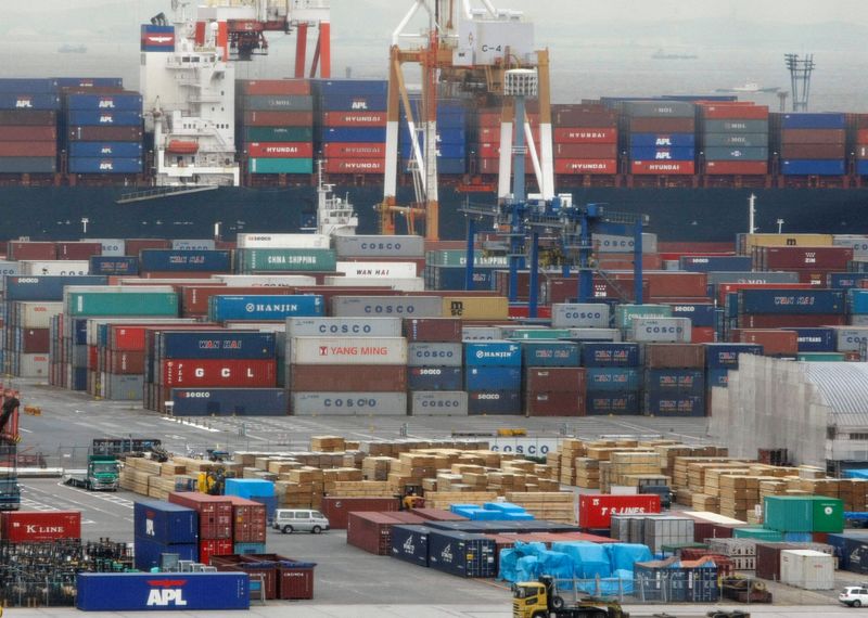 &copy; Reuters. FILE PHOTO: Containers are seen at a pier of cargo area at a port in Yokohama, south of Tokyo December 22, 2008. REUTERS/Issei Kato/File Photo