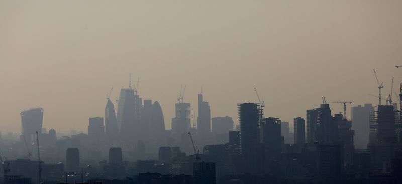 &copy; Reuters. FILE PHOTO: Buildings and construction cranes are seen through a heat haze in London, Britain, May 6, 2018.    REUTERS/Kevin Coombs