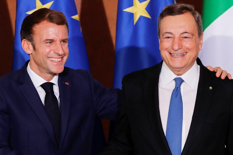 &copy; Reuters. French President Emmanuel Macron and Italy's Prime Minister Mario Draghi smile during a news conference after signing an accord to try to tilt the balance of power in Europe, at Villa Madama in Rome, Italy, November 26, 2021. REUTERS/Remo Casilli