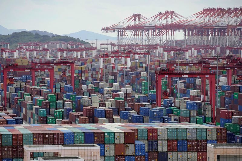&copy; Reuters. FILE PHOTO: Containers are seen at the Yangshan Deep-Water Port in Shanghai, China October 19, 2020. REUTERS/Aly Song/File Photo/File Photo
