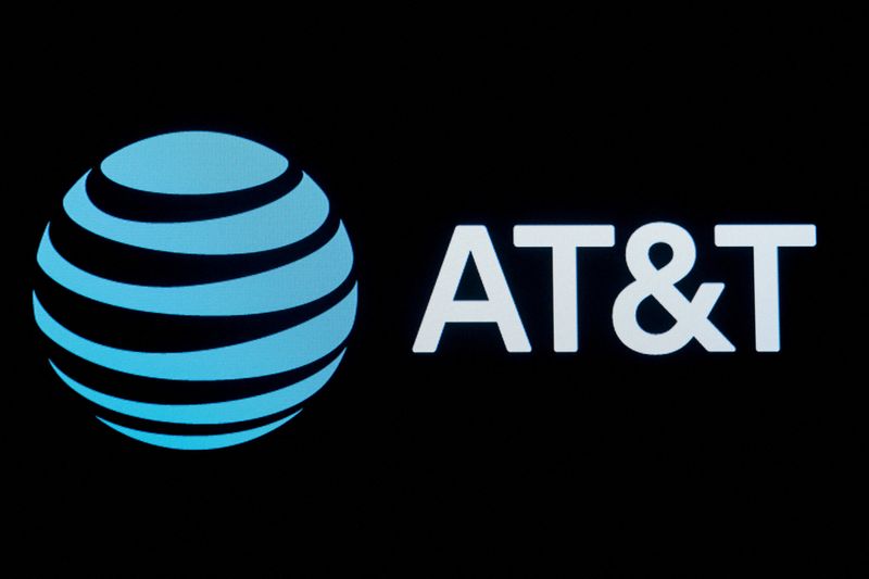 &copy; Reuters. FILE PHOTO: The company logo for AT&T is displayed on a screen on the floor at the New York Stock Exchange (NYSE) in New York, U.S., September 18, 2019. REUTERS/Brendan McDermid/File Photo