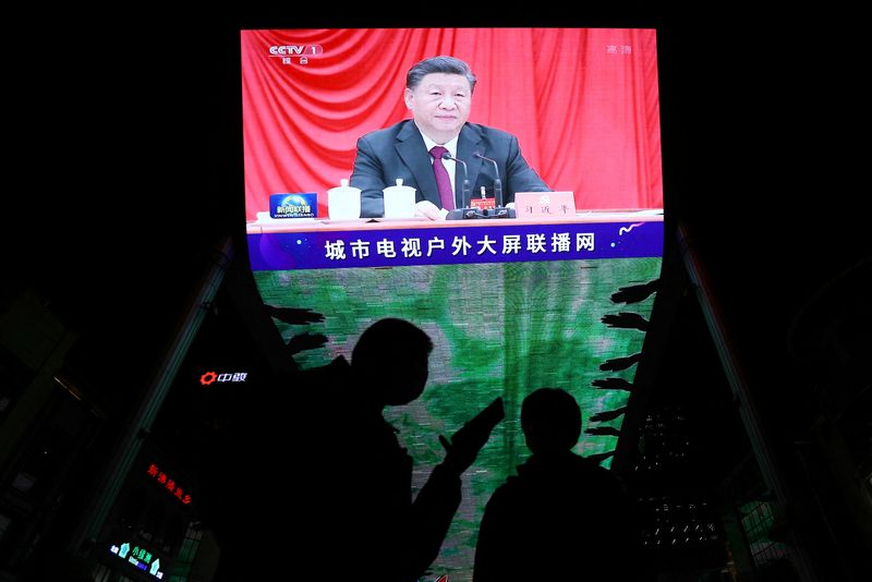 &copy; Reuters. FILE PHOTO: A giant screen shows Chinese President Xi Jinping attending the sixth plenary session of the 19th Central Committee of the Communist Party of China (CPC), in Beijing, China November 11, 2021. REUTERS/Tingshu Wang