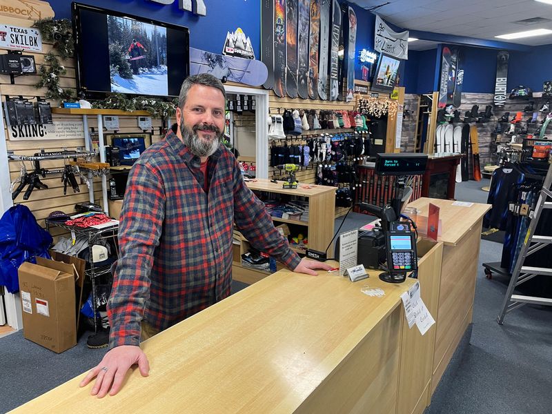 &copy; Reuters. Phillip Howard poses for a photo inside his Troy's Ski Lubbock shop, in Lubbock, Texas, January 14, 2022. Picture taken January 14, 2022. Howard says supply chain woes are making life extremely difficult for small business owners like himself. REUTERS/Bra