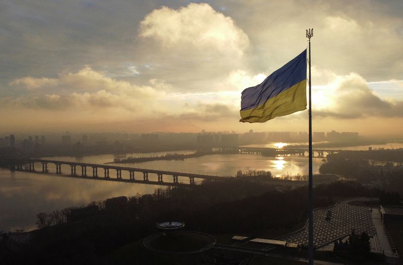 &copy; Reuters. FILE PHOTO: Ukraine's biggest national flag on the country's highest flagpole is seen at a compound of the World War II museum in Kyiv, Ukraine, December 16, 2021. Picture taken with a drone.  REUTERS/Valentyn Ogirenko