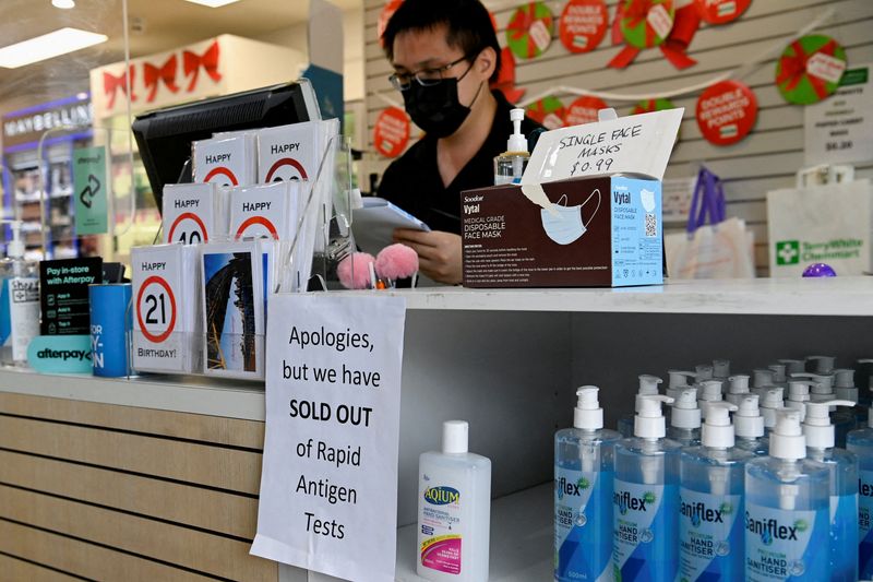 &copy; Reuters. FILE PHOTO: A pharmacy displays a sign to inform customers that Rapid Antigen Test kits are sold out in wake of the coronavirus disease (COVID-19) in Sydney, Australia, January 5, 2022.  REUTERS/Jaimi Joy