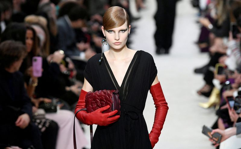 &copy; Reuters. FILE PHOTO: A model presents a creation by designer Pierpaolo Piccioli as part of his Fall/Winter 2020/21 women's ready-to-wear collection show for fashion house Valentino during Paris Fashion Week in Paris, France, March 1, 2020. REUTERS/Piroschka van de