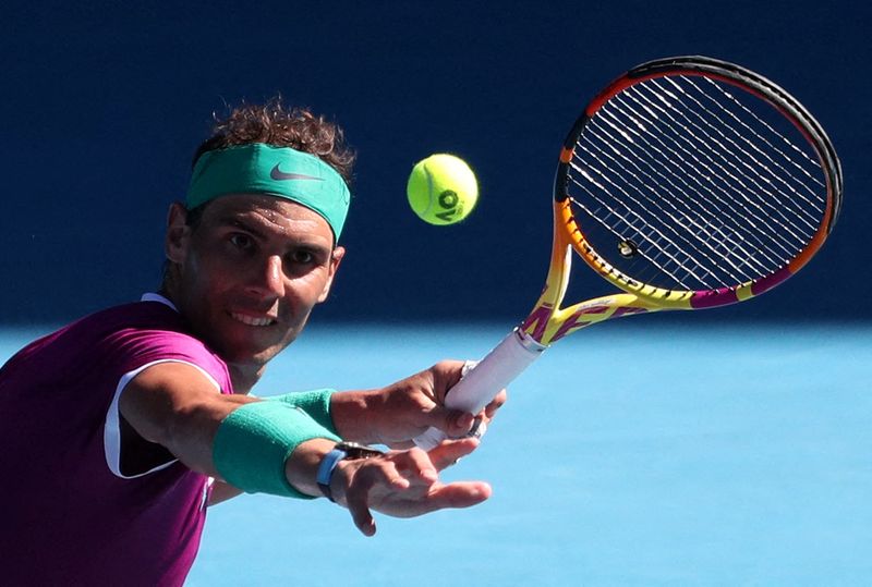 &copy; Reuters. El tenista español Rafael Nadal en acción durante su partido contra el estadounidense Marcos Giron por la primera ronda del Abierto de Australia en Melbourne Park, Melbourne, Australia. 17 de enero, 2022. REUTERS/Asanka Brendon Ratnayake