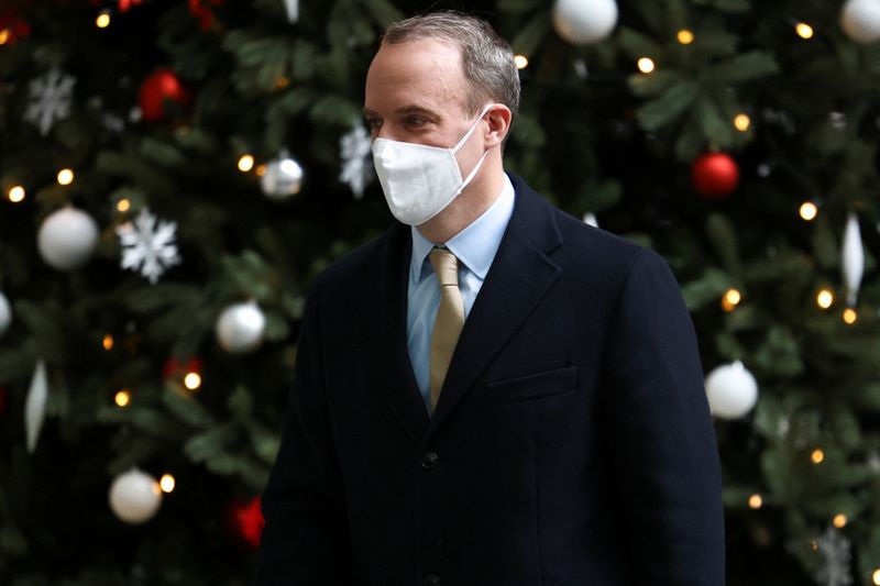 &copy; Reuters. FILE PHOTO: Britain's Justice Secretary Dominic Raab arrives at the BBC headquarters to appear on The Andrew Marr Show, in London, Britain December 5, 2021. REUTERS/Henry Nicholls