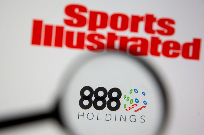 &copy; Reuters. FILE PHOTO: 888 Holdings logo are seen through magnifier near Sports Illustrated logo in illustration taken, June 24, 2021. REUTERS/Dado Ruvic/Illustration