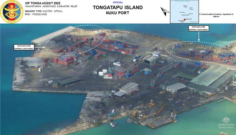 © Reuters. View of tsunami damage after the Pacific island nation was hit after a massive undersea volcanic eruption in Nuku Port, Tongatapu Island, Tonga, released January 18, 2022, in this reconnaissance photo taken from a Royal Australian Air Force P-8A Poseidon maritime patrol aircraft surveillance flight. Australian Department of Defence/Handout via REUTERS 