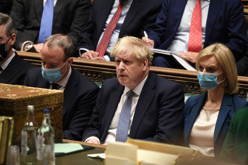 © Reuters. FILE PHOTO: British Prime Minister Boris Johnson attends the weekly Prime Minister's Questions at the parliament in London, Britain, January 12, 2022. UK Parliament/Jessica Taylor/Handout via REUTERS 