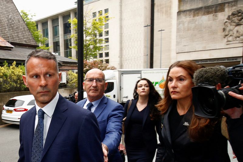 &copy; Reuters. FILE PHOTO: Former Manchester United soccer player Ryan Giggs leaves Manchester Crown Court, where he is charged with assault against two women, in Manchester, Britain May 28, 2021. REUTERS/Jason Cairnduff