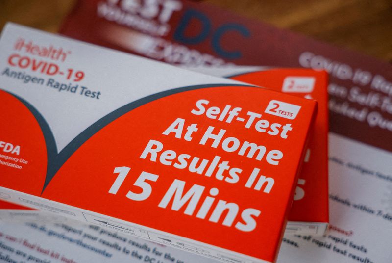 &copy; Reuters. FILE PHOTO: Take-home COVID-19 self testing kits provided by the District of Columbia government, which provides city residents four free take home tests per day, are seen in this illustration taken January 11, 2022. REUTERS/Evelyn Hockstein