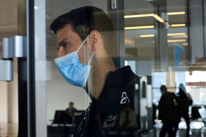 &copy; Reuters. FILE PHOTO: Serbian tennis player Novak Djokovic arrives at Nikola Tesla Airport, after the Australian Federal Court upheld a government decision to cancel his visa to play in the Australian Open, in Belgrade, Serbia January 17, 2022. REUTERS/Christopher 
