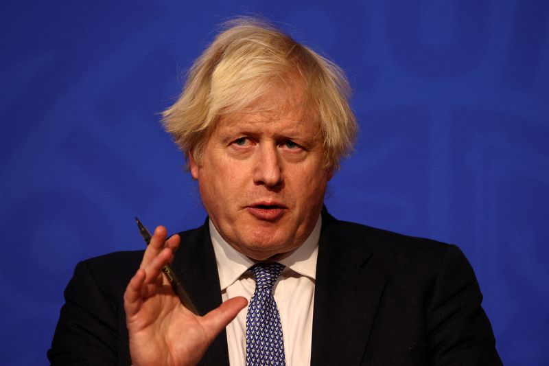 &copy; Reuters. FILE PHOTO: British Prime Minister Boris Johnson holds a news conference for the latest coronavirus disease (COVID-19) update in the Downing Street briefing room, in London, Britain December 8, 2021. Adrian Dennis/Pool via REUTERS/File Photo