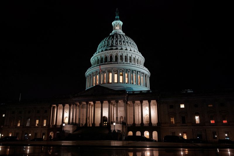 &copy; Reuters. FILE PHOTO: The U.S. Capitol dome is seen at night as the Senate continues debate of voting rights legislation in Washington, U.S., January 19, 2022. REUTERS/Elizabeth Frantz