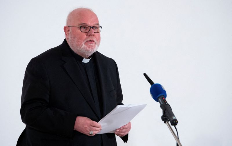&copy; Reuters. Reinhard Marx, the cardinal of the Munich and Freising Archdiocese addresses a news conference after a survey on allegations of sexual abuse in the southern German Archdiocese between 1945 and 2019 was published in Munich, Germany, January 20, 2022. Sven 