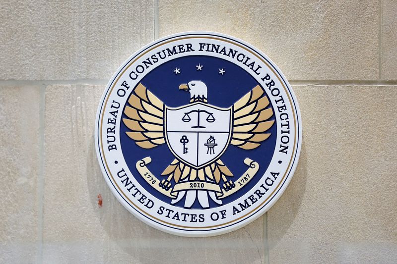 &copy; Reuters. FILE PHOTO: The seal of the Consumer Financial Protection Bureau (CFPB) is seen at their headquarters in Washington, D.C., U.S., May 14, 2021. REUTERS/Andrew Kelly/File Photo