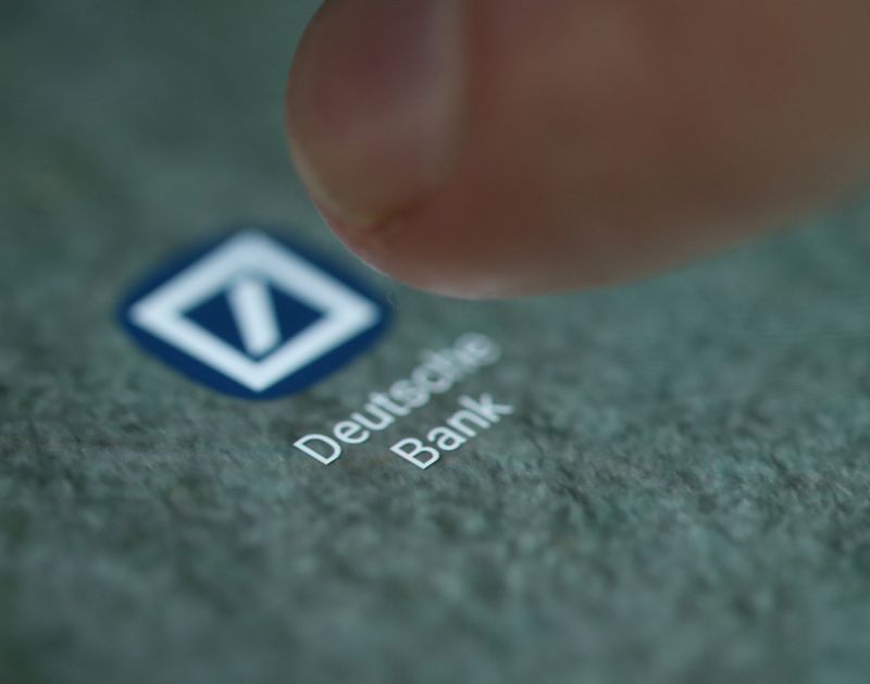 &copy; Reuters. FILE PHOTO: The Deutsche Bank app logo is seen on a smartphone in this picture illustration taken September 15, 2017. REUTERS/Dado Ruvic/Illustration