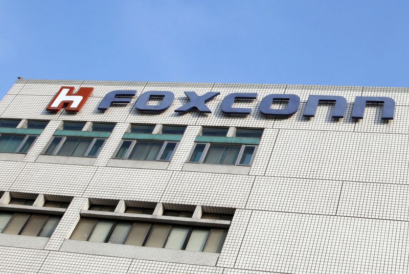 &copy; Reuters. FILE PHOTO: The Foxconn logo is seen on the headquarters building in Tucheng, Taipei County May 25, 2010. REUTERS/Nicky Loh 
