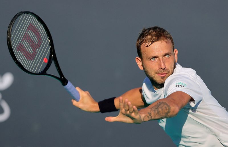 &copy; Reuters. FILE PHOTO: Tennis - Mubadala World Tennis Championship - International Tennis Centre, Zayed Sports City, Abu Dhabi, United Arab Emirates - December 17, 2021 Britain's Dan Evans in action during his match against Taylor Fritz of the U.S. REUTERS/Christoph