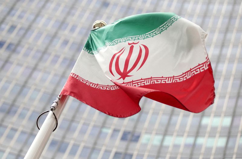 &copy; Reuters. FILE PHOTO: The Iranian flag flutters in front the International Atomic Energy Agency (IAEA) headquarters in Vienna, Austria July 10, 2019.  REUTERS/Lisi Niesner/File Photo