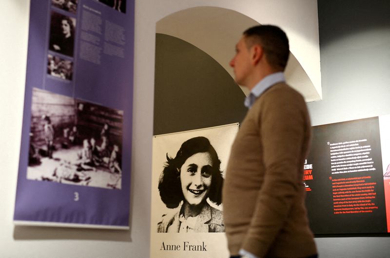 &copy; Reuters. FILE PHOTO: A man looks at an exhibition about Anne Frank at the Victory museum in Sibenik, Croatia, February 3, 2017. REUTERS/Antonio Bronic/File Photo