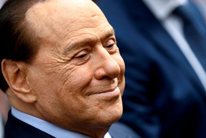 &copy; Reuters. FILE PHOTO: Italy's former prime minister, Silvio Berlusconi, reacts after casting his vote during Italian elections for mayors and councillors, in Milan, Italy, October 3, 2021. REUTERS/Flavio Lo Scalzo/File Photo