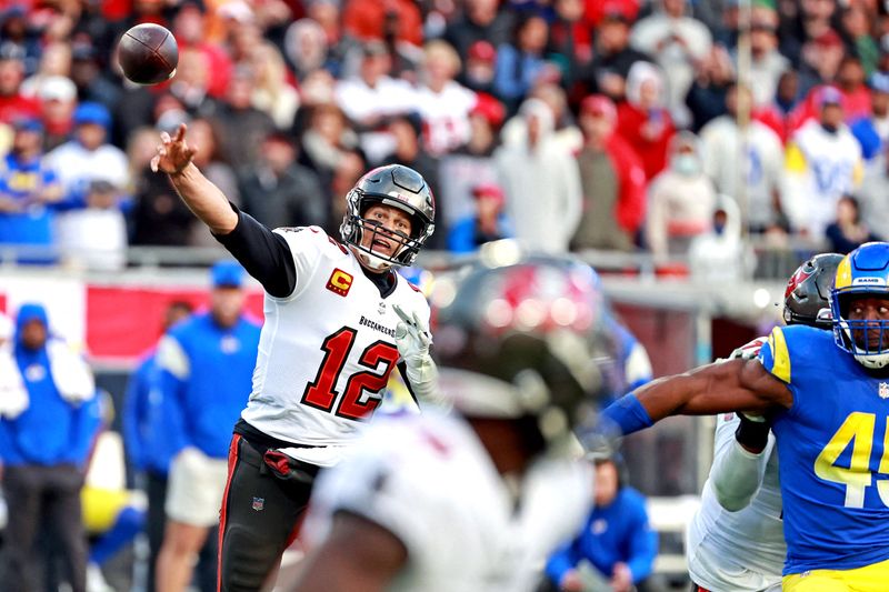 © Reuters. Jan 23, 2022; Tampa, Florida, USA; Tampa Bay Buccaneers quarterback Tom Brady (12) throws a the ball during the second half against the Los Angeles Rams in a NFC Divisional playoff football game at Raymond James Stadium. Mandatory Credit: Matt Pendleton-USA TODAY Sports