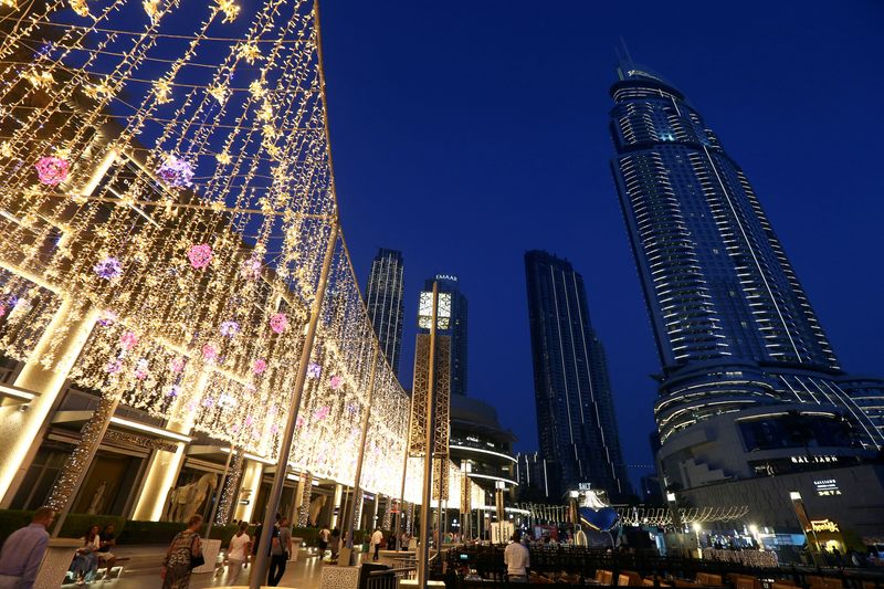 &copy; Reuters. FILE PHOTO: People walk outside The Dubai Mall in Dubai, United Arab Emirates March 12, 2020. Picture taken March 12, 2020. REUTERS/Satish Kumar/